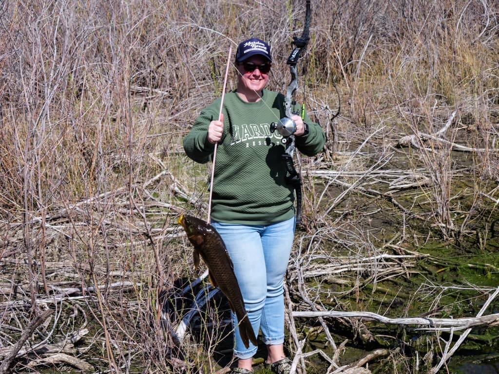 A happy angler with a fresh catch