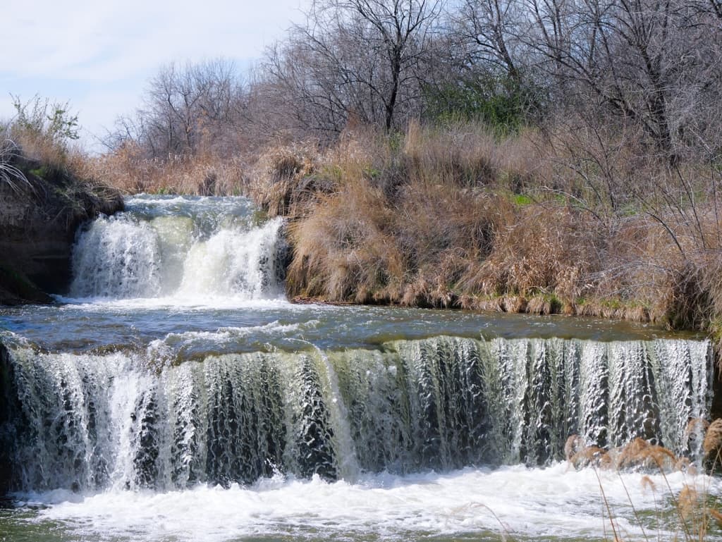 A scenic waterfall near the resort